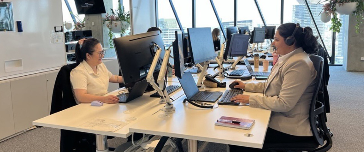 Customer Operations team members in the office.