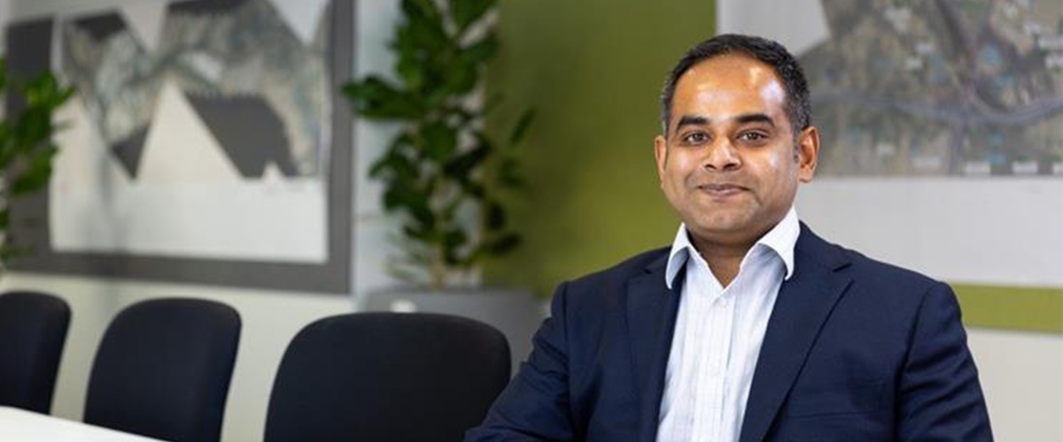 Narayanan in a boardroom.